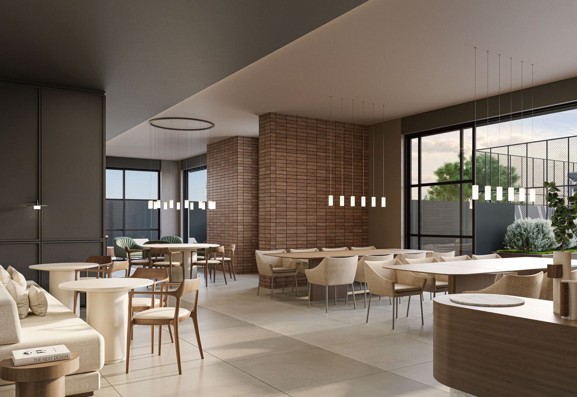 Clubhouse com mesas e áreas de estar